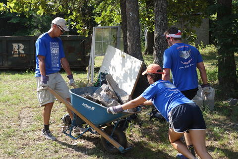 Concrete chunks contained by a wheelbarrow