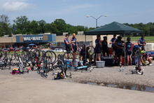 Bikes at lunch in a parking lot. 