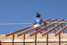 Maya working on the roof trusses. 